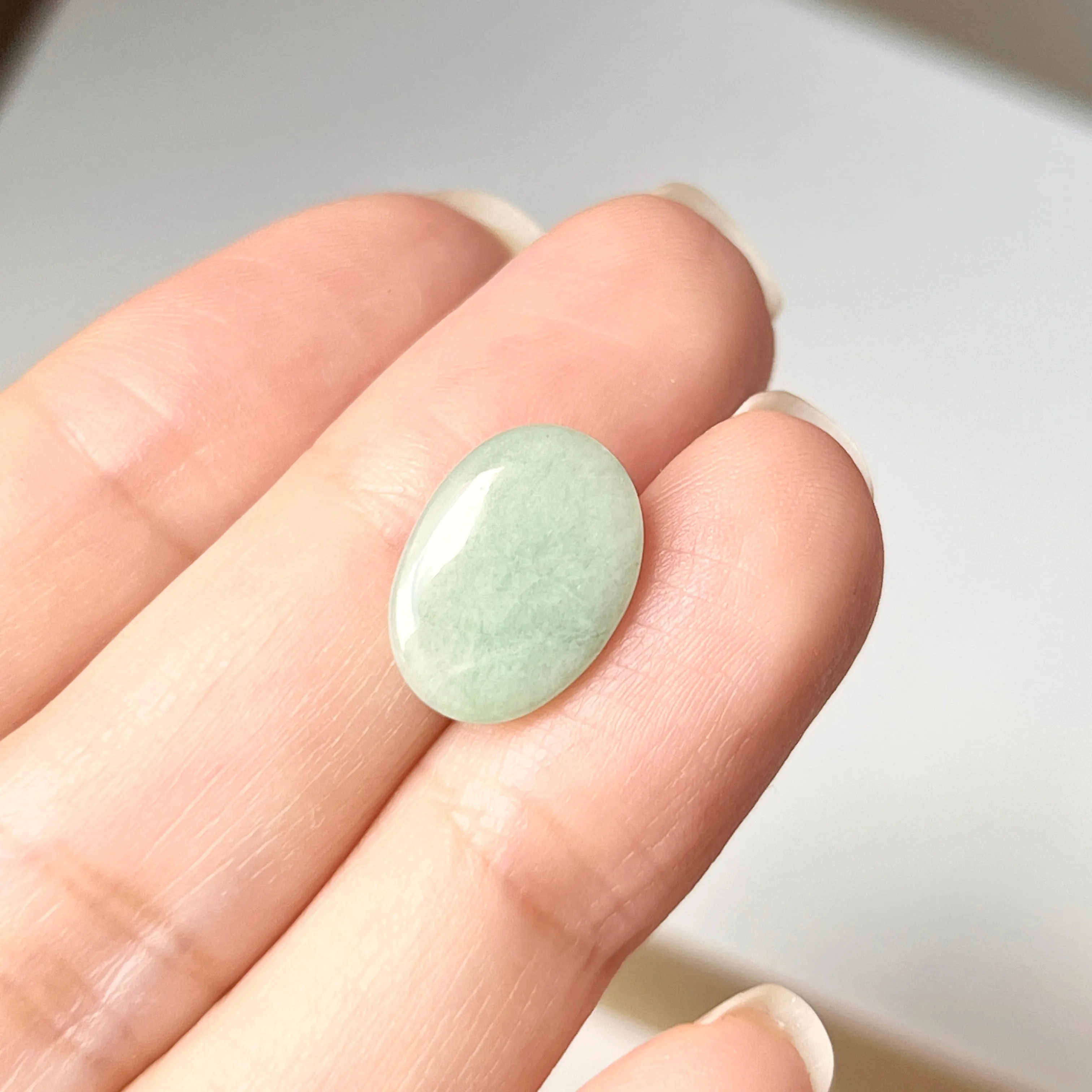 6.05cts A-Grade Natural Moss on Snow Jadeite Oval Cabochon No. 130469